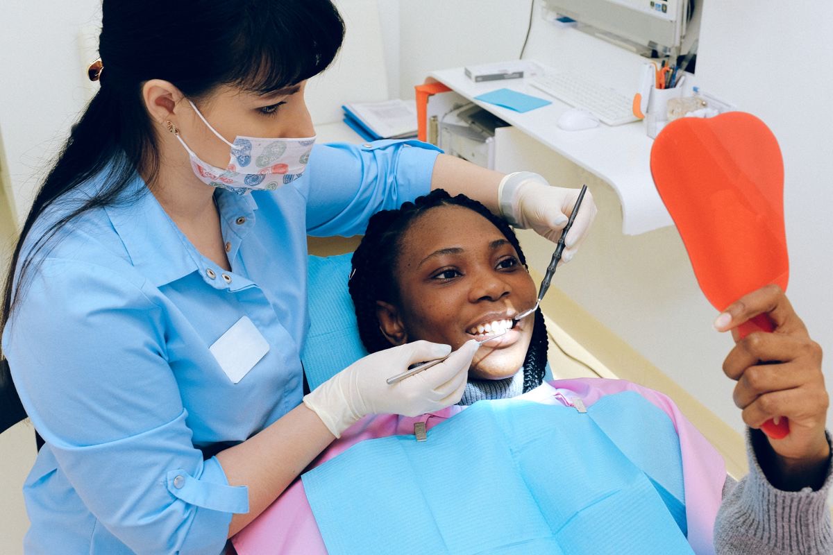 Gentle dental check-up with a dentist examining a patient